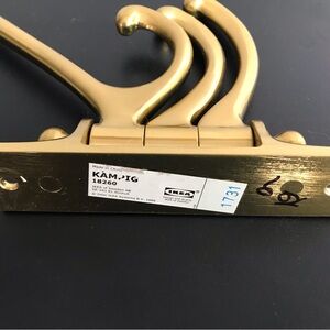 IKEA Brass-colored triple mobile hook. Like new